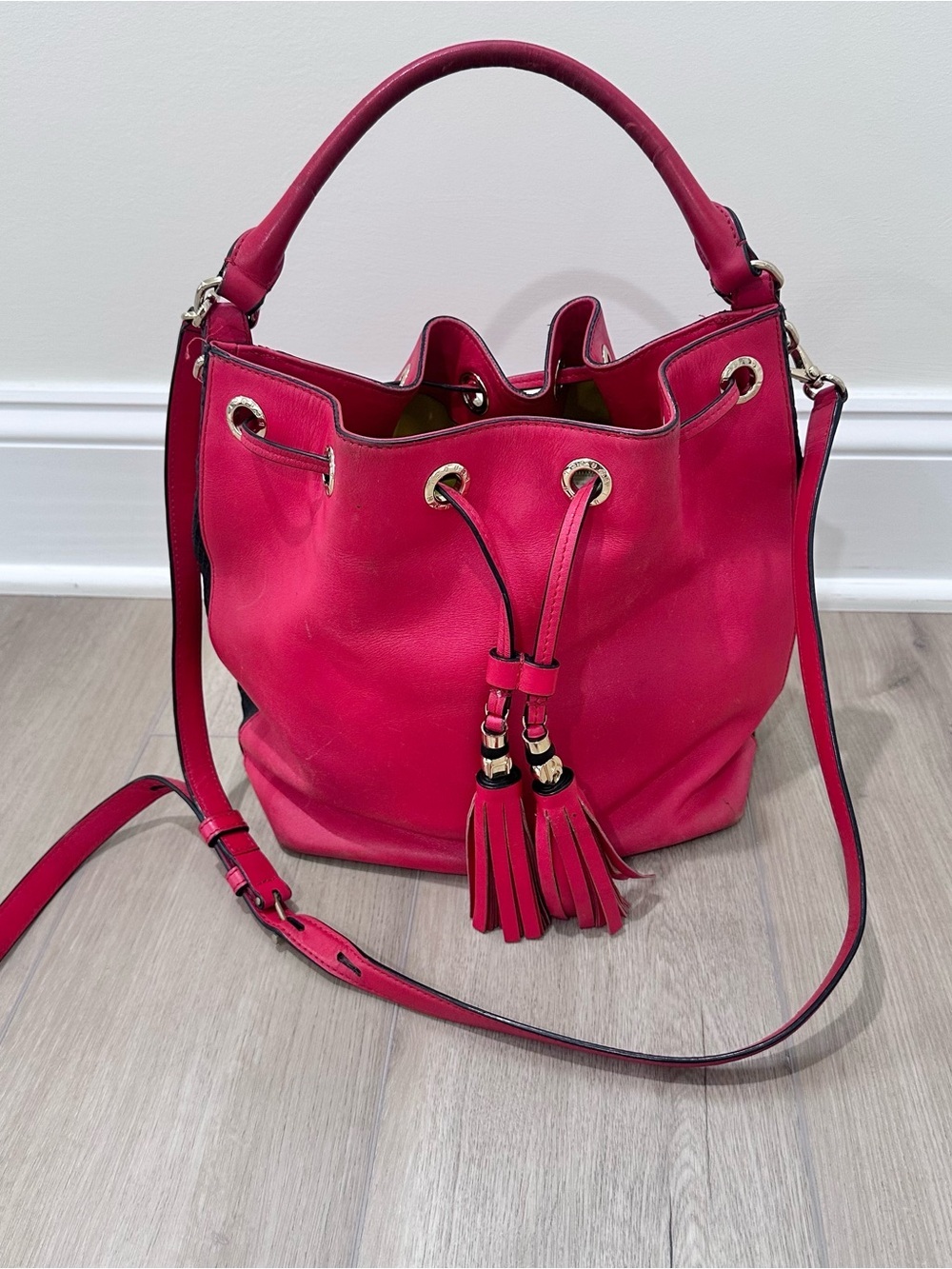 Henri Bendel leather Bucket Bag vibrant red w tassels